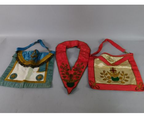 A Masonic apron, St Anthony 154, further apron decorated in stump work with a nesting bird, cross and roses, and a matching s