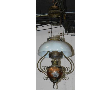 A Continental late 19thC copper and brass hanging oil lamp, with double chain suspension and a white glass shade, approx 90cm
