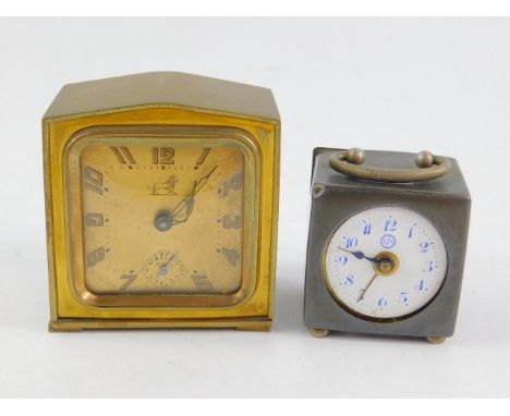 A French early 20thC brass cased bedroom clock, square dial bearing Arabic numerals, subsidiary seconds dial, 7cm x 4cm x 7cm