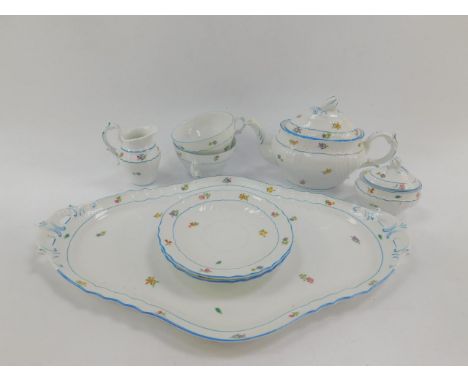 A Richard Ginori porcelain tete a tete, decorated with floral sprigs, printed mark, comprising teapot, sucrier, cream jug, tw