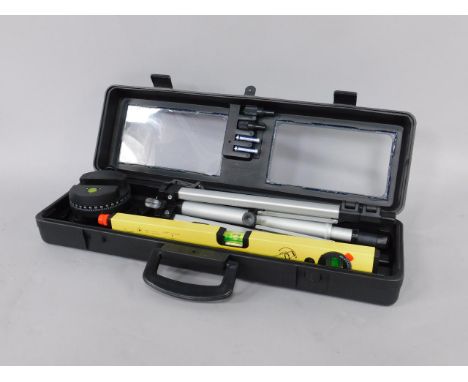 A Cougar laser level, CGCD18-80A-L-K, boxed with instructions.