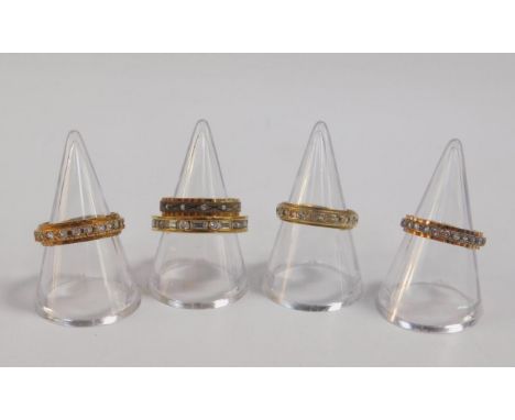 Five 9ct gold and gem set full eternity rings, sizes K-O, 14.1g.
