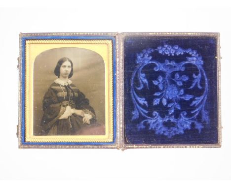 A Daguerreotype portrait of Emily Baines, 9cm x 8cm. NB. This lot is sold on behalf of the Estate of  John Hewley Baines late