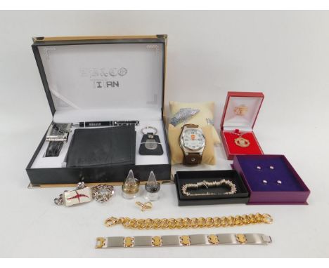 Gentleman's costume and silver jewellery, including a titanium ring, stainless steel bracelet, Manchester United wristwatch a