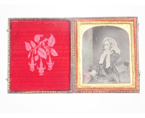 A Daguerreotype portrait of a lady, 9.5cm x 7.5cm. NB. This lot is sold on behalf of the Estate of  John Hewley Baines late o