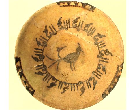 Ceramic dish with obvious decorations originating in north Afghanistan about 1800 years ago. Glazed yellow/green, decorated w