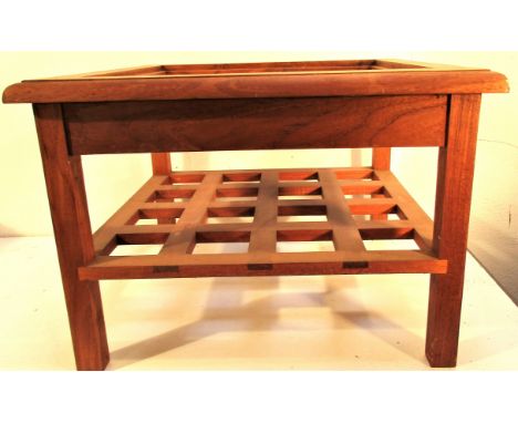 Hard wood stool with shelf and recessed top suitable for glass or cushion.  52 x 52 x 25cm. 