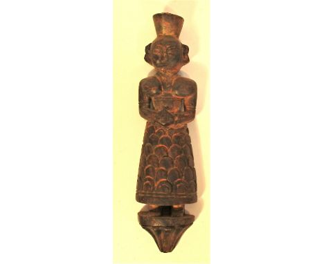 Lemon Squeezer from India. Hand carved from a hard wood. 30 x 6cm. Late 20th c.  