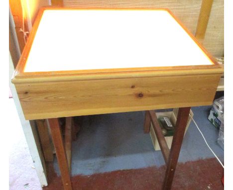 Light table.  Glass top with 2 fluorescent tubes under. Perfect for copying and tracing. 65 x 65 x 77cm. high  