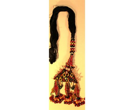 Turkoman or Uzbek hair braid hair extension.  Black cotton with a bead covered amulet.  80cm Late 20th c. 