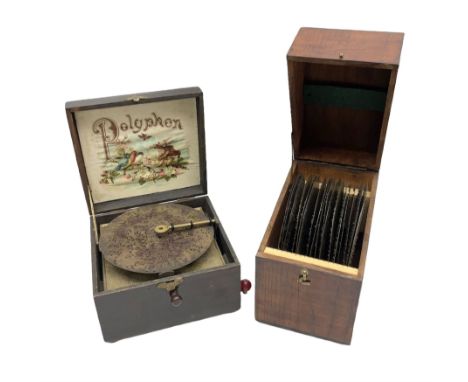 Early 20th century polyphon in simulated rosewood case with side cranking handle, thirty-two tooth comb and pictorial card to