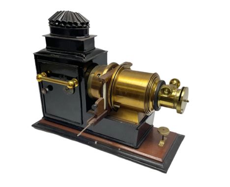 French magic lantern, in brass and black japanned tin case with carrying handles, four adjustable burners and height adjuster