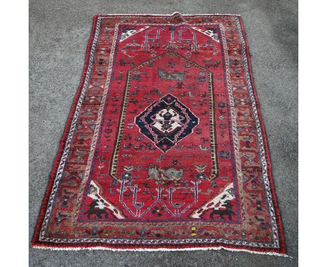 Vintage Persian Hamadan village rug, with red ground 235 x 148 cmCondition Report:  Recently restored. One end has been cut d