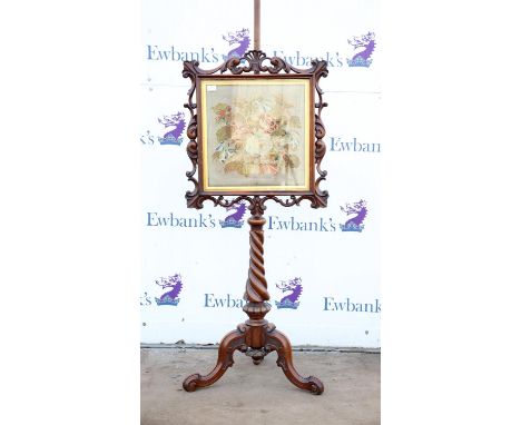 Victorian rosewood pole screen with carved decoration on spiral column and tripod base, h177cm, w59cm,