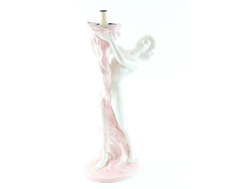 Italian ceramic figurative table lamp, in the form of a woman. With significant damage to the head of the statue. Height 54cm