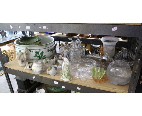 Large basin with holly and ivy decoration, a wash bowl, continental figurines and various glassware including bowls and plate