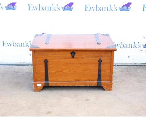 Stained pine and metal bound trunk, h42 x w75 x d48cm,