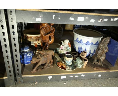 Various Asian art, including a carved hardwood figure of an Elder, 27 cm high, Chinese blue and white jardiniere, prunus ging