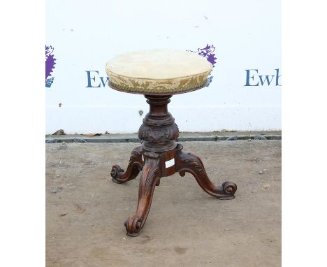 Victorian mahogany piano stool with circular seat on carved column and tripod base, 46cm high,