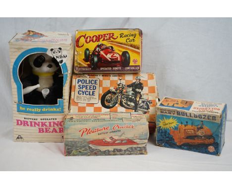 A collection of vintage tin plate toys to include Police Speed Cycle (boxed), battery operated Drinking Bear by ALPS (boxed),