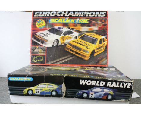 Two boxed Scalextric sets to include Eurochampions and World Rallye, appearing complete with both slot cars, with tatty boxes
