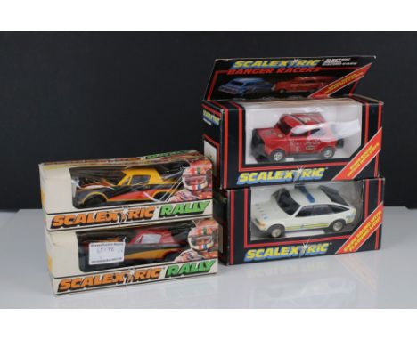 Four boxed Scalextric slot cars to include 2 x Rally Cars  C114 Triumph TR7 &amp; C113 Triumph TR7 (damage to box window), C2