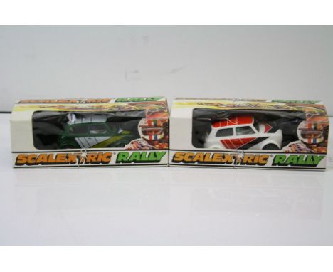 Two boxed Scalextric Rally slot cars to include C.110 Mini Clubman in white and C.112 Mini Clubman in green, boxes in good co