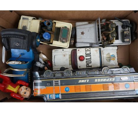 A collection of vintage tin plate toys to include the Express Line locomotive, Japanese military jeep, Japanese police jeep, 