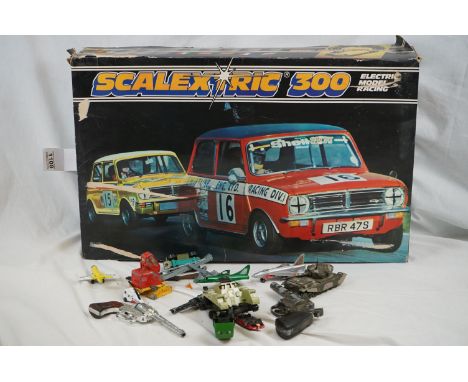 Boxed Scalextric 300 C579, appearing complete with both cars, tatty box, plus a collection of diecast vehicles and toy guns t