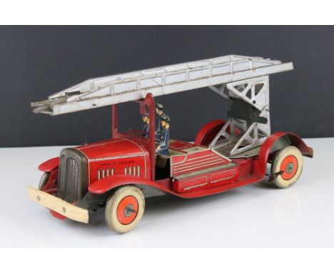 Mettoy tin plate clockwork fire engine model with 3 x fireman figures, tyres marked Dunlop Fort, some wear but gd overall 