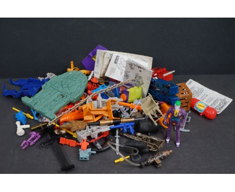 Quantity of various 1980 / 1990's toy accessories, parts and instructions to include Hasbro Takara Transformers, Mattel He Ma