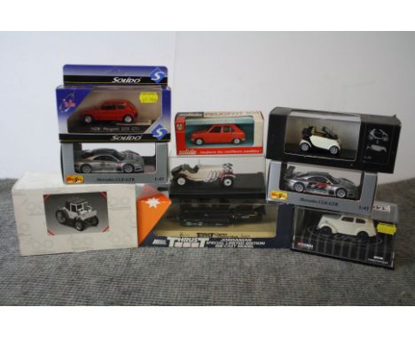 Nine boxed and cased diecast models to include Corgi 01401 Ford Popular, 2 x Maisto 1:43 scale Mercedes CLK-GTR (one loose in