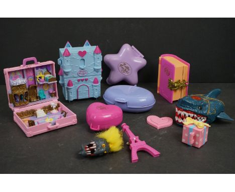 Seven Bluebird Polly Pocket playsets and figures to include Precious Puppies, Boutique Suitcase, etc, plus 2 x Bluebird Might