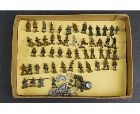 Over 50 small scale mid 20th C painted metal  military figures to include Skybirds and Dinky plus unpainted metal dog and car