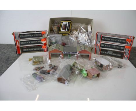 Seven boxed N gauge items of rolling stock to include 6 x Lima and a Graham Farish, plus a quantity of N gauge trackside buil