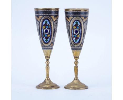 Pair of Russian 875 Silver and Enamel Cups. Chased niello decoration with enameled and Jeweled panels. Marked 875. Good condi