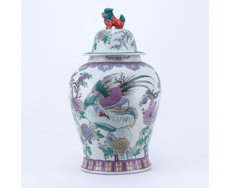 Large Chinese Famille Rose Porcelain Covered Urn with Foo Dog Finial. Marked on underside. Rubbing to paint and some discolor