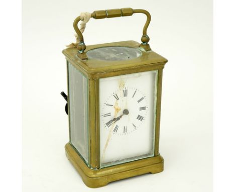 Antique Carriage Clock With Open Escapement. Key included. Unmarked. Obvious wear with rust, not running. The gallery does no