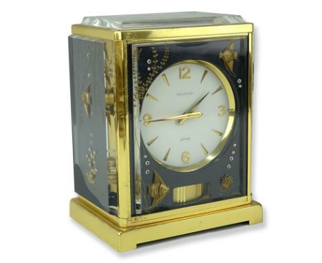 Jaeger LeCoultre Swiss Black Aquarium Atmos Clock. Markers mark on dial and inscribed Marina lower right. Gilt brass frame wi