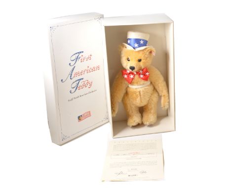 Modern Steiff teddy bear; First American Teddy, blond, with top hat and bow tie, 38cm tall, no.7428 in the edition, with cert