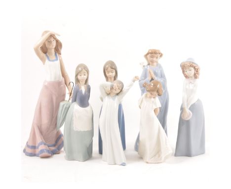 Nao porcelain figure, girl with a parasol, 31cm, and six other Nao porcelain figures, (7).