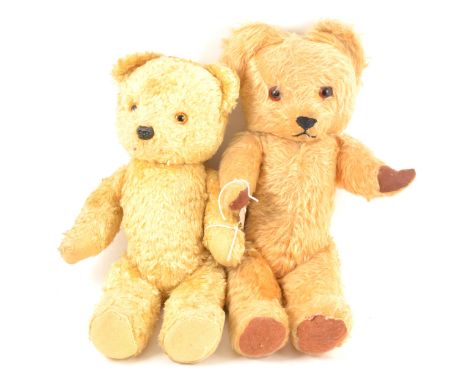 Two vintage teddy bears; both c1950s, one with Eire label, straw filled, 42cm tall, another straw filled, 39cm tall, both wit