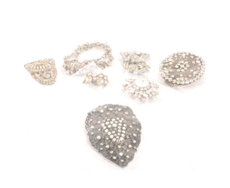 A collection of vintage paste brooches, clips, necklaces, buckles, earrings, bracelets