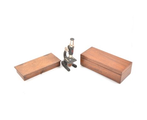 All brass balance scale, 15cm bar, in an oak box; small balance scale, without weights; mahogany box and a student's microsco