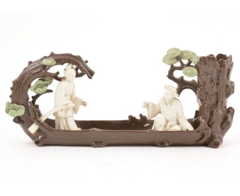 A Minton majolica model of a Japanese boat, designed by John Henk, 32cm, damaged.