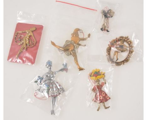 Thirteen vintage novelty brooches, ballerinas, French flower vendeuse, Spanish dancers, a lady with fruit in a basket by the 