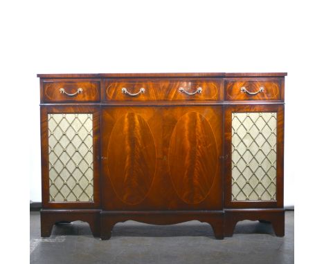 Reproduction Regency mahogany breakfront sideboard, three frieze drawers above cupboards, bracket feet, width 138cm, depth 42
