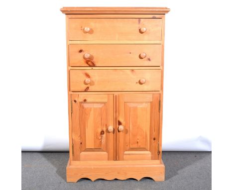 Pine tallboy, rectangular top, three drawers above a cupboard, bracket feet, width 69cm, depth 43cm, height 116cm.