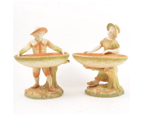 Pair of Royal Worcester porcelain table ornaments, figures with baskets, date mark from 1905, modelled under 960 &amp; 961, 2