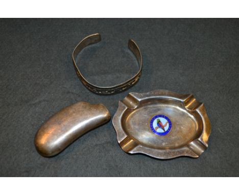Silver- a silver ash tray, Birmingham; holder, London; bangle (3) 